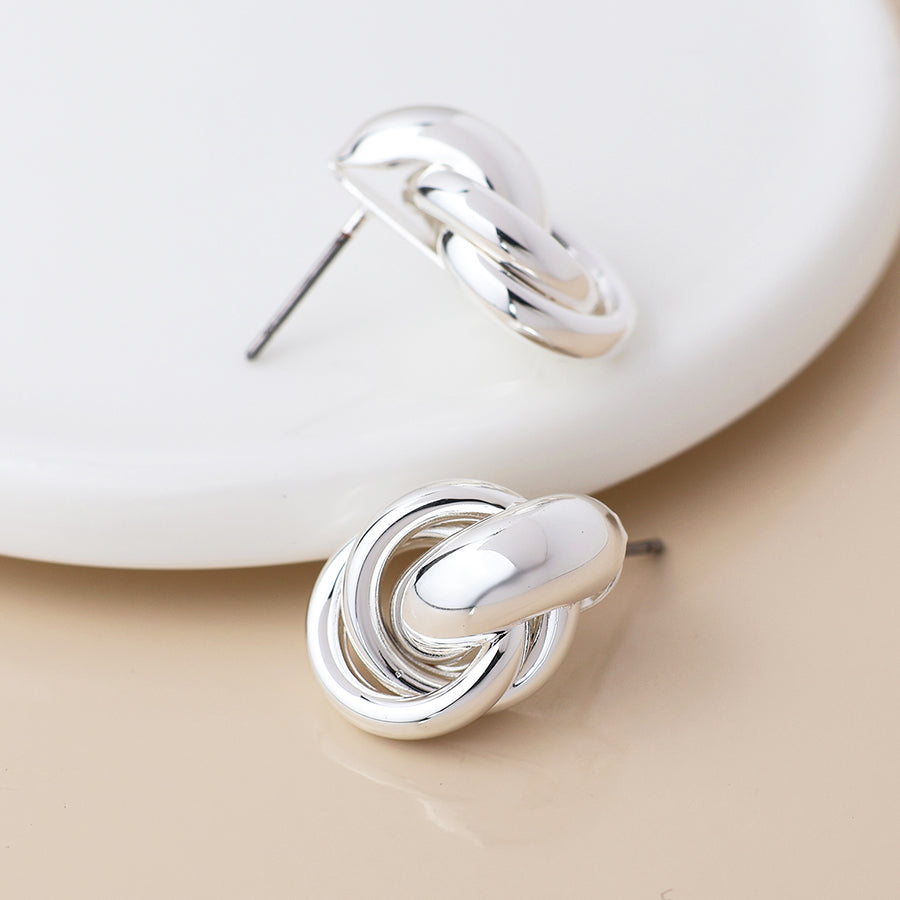 POM Silver plated polished knot earrings