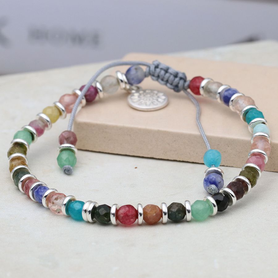 POM Cord Bracelet With Rainbow Coloured Beads And Silver Plated Beads