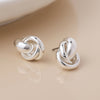 POM Silver plated polished knot earrings