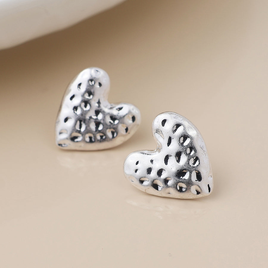 POM Silver plated worn hammered heart earrings