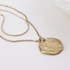 POM Solstice POM Worn golden textured disc layered chain necklace