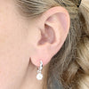 Iris & Miel Sterling Silver Two Tone Daisy Charm Huggie Earrings
