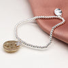 POM Faux Gold Cut-Out Stars Disc Silver Plated Bracelet
